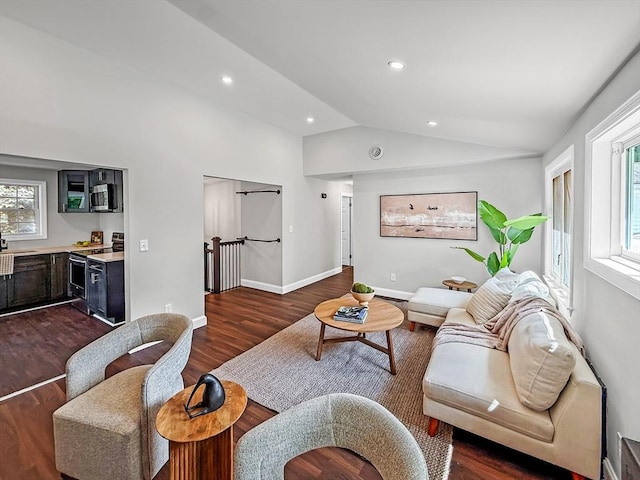 78 Howland Rd, Stoughton, MA 02072 - living area with vaulted ceiling, dark wood finished floors, recessed lighting, and baseboards