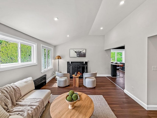 78 Howland Rd, Stoughton, MA 02072 - living area featuring a fireplace, lofted ceiling, baseboards, dark wood-style floors, and recessed lighting