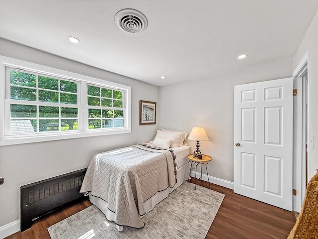 78 Howland Rd, Stoughton, MA 02072 - bedroom featuring radiator heating unit, wood finished floors, baseboards, and recessed lighting