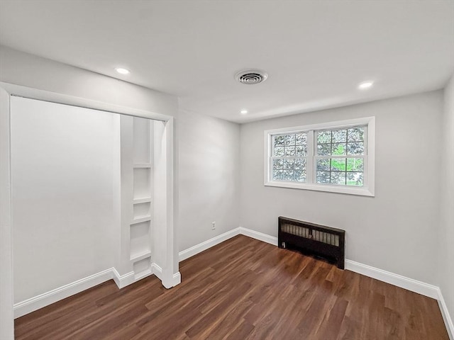 78 Howland Rd, Stoughton, MA 02072 - unfurnished bedroom featuring dark wood-type flooring, baseboards, recessed lighting, and a closet
