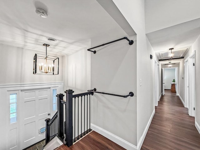 78 Howland Rd, Stoughton, MA 02072 - entryway featuring dark wood finished floors, baseboards, and a chandelier