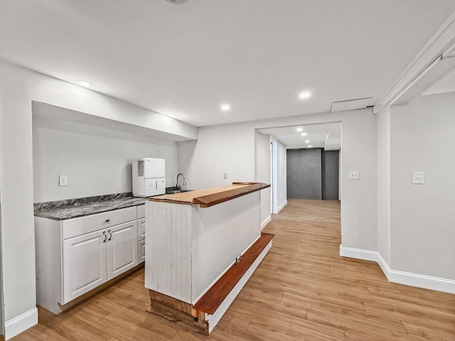 78 Howland Rd, Stoughton, MA 02072 - bar area featuring light wood-style floors, baseboards, and recessed lighting