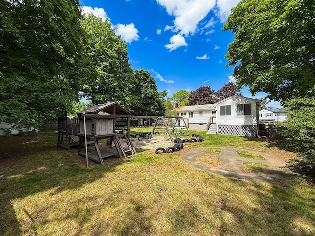 78 Howland Rd, Stoughton, MA 02072 - view of grassy yard with a playground