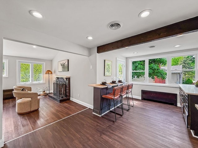 78 Howland Rd, Stoughton, MA 02072 - office space with dark wood-style flooring, baseboards, a fireplace, beam ceiling, and recessed lighting