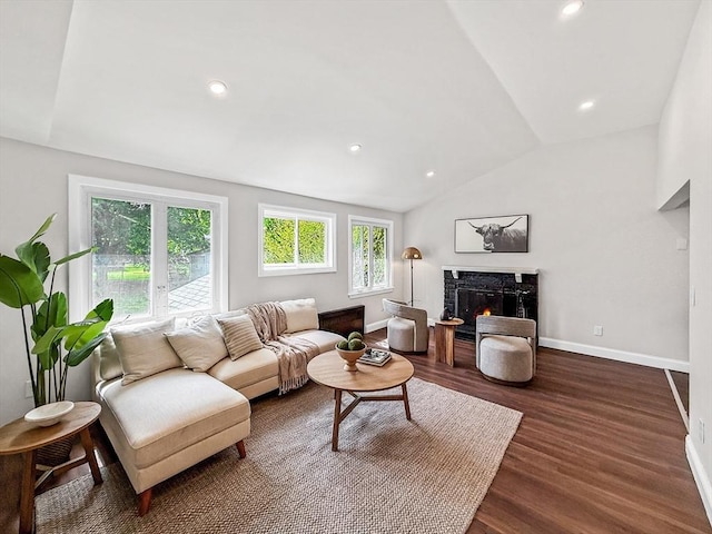78 Howland Rd, Stoughton, MA 02072 - living room featuring dark wood finished floors, a premium fireplace, baseboards, lofted ceiling, and recessed lighting