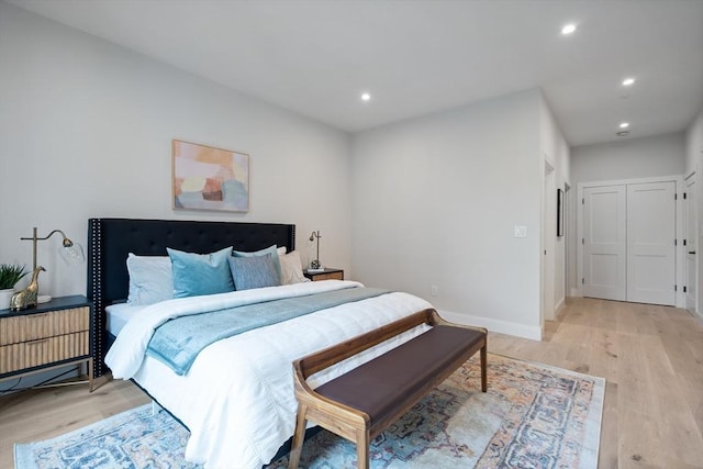 bedroom with light wood-type flooring