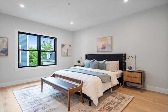 bedroom featuring light wood-type flooring