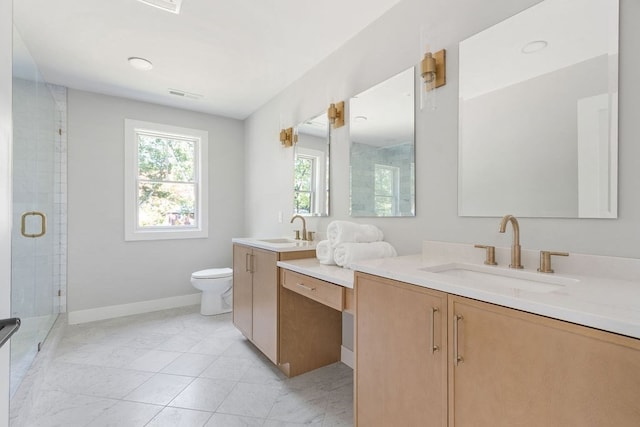 bathroom featuring walk in shower, vanity, and toilet