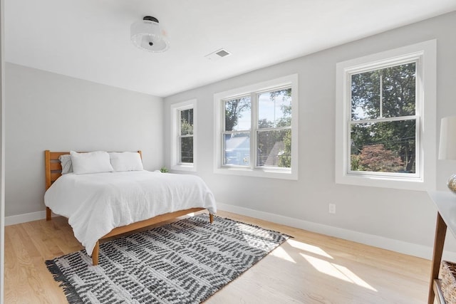 bedroom featuring light wood-type flooring