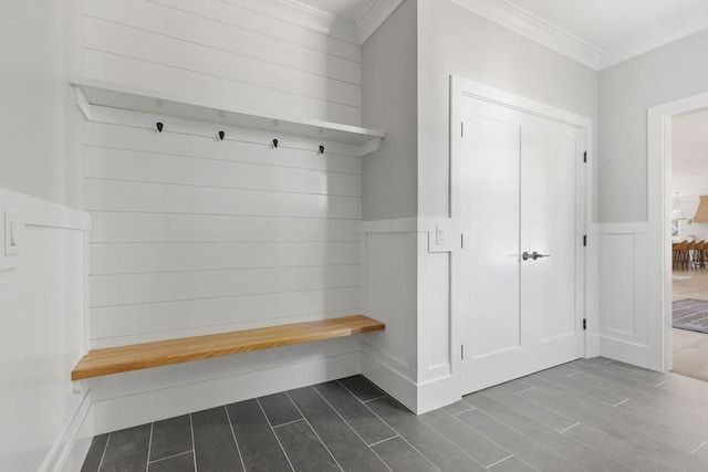 mudroom featuring dark hardwood / wood-style floors and crown molding