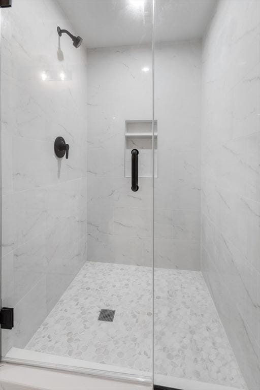 bathroom with a stall shower