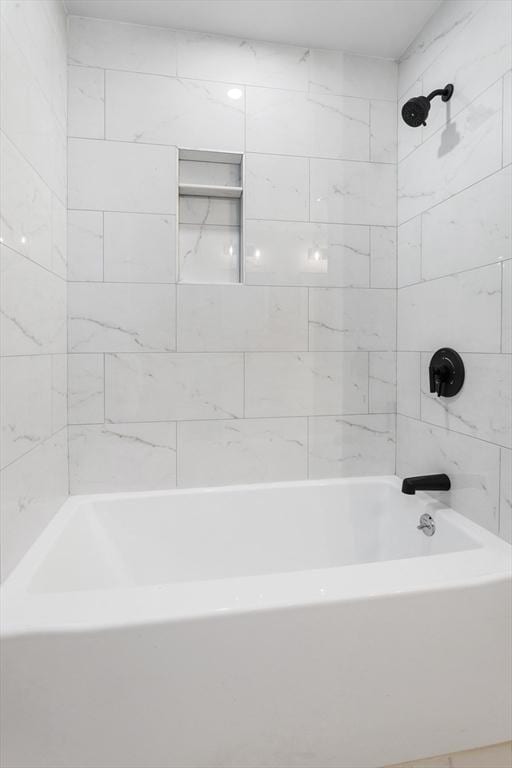 full bath featuring shower / bathtub combination