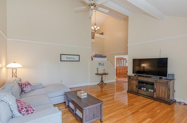 3 Riverside Dr, Mattapoisett, MA 02739 - living area featuring high vaulted ceiling, beam ceiling, light wood-type flooring, ceiling fan, and a chandelier
