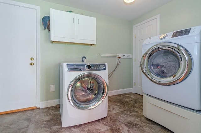 3 Riverside Dr, Mattapoisett, MA 02739 - laundry area featuring cabinet space and washer and dryer
