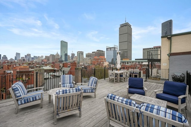 wooden deck featuring an outdoor hangout area