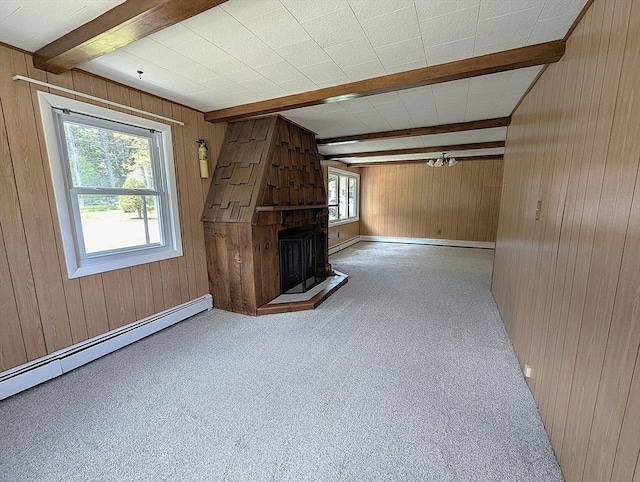 22 Newton Ave, Tewksbury, MA 01876 - unfurnished living room featuring beamed ceiling, wooden walls, baseboard heating, and carpet flooring