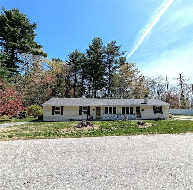 22 Newton Ave, Tewksbury, MA 01876 - ranch-style house featuring a front lawn and view of scattered trees