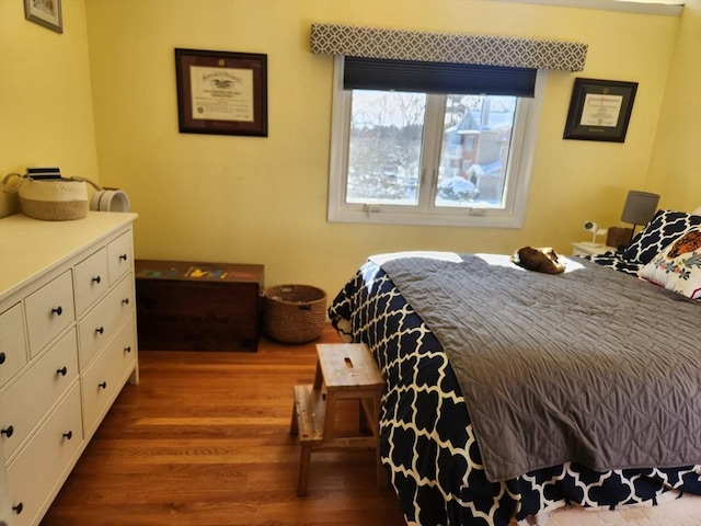 bedroom featuring dark hardwood / wood-style floors