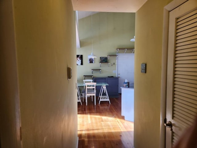 hall with hardwood / wood-style floors