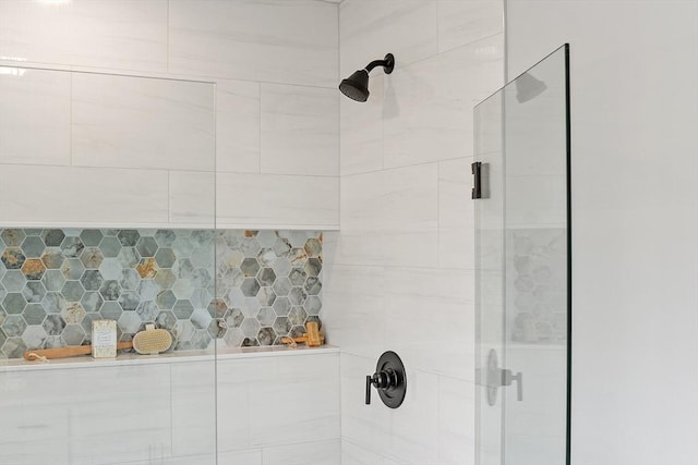 bathroom featuring a stall shower