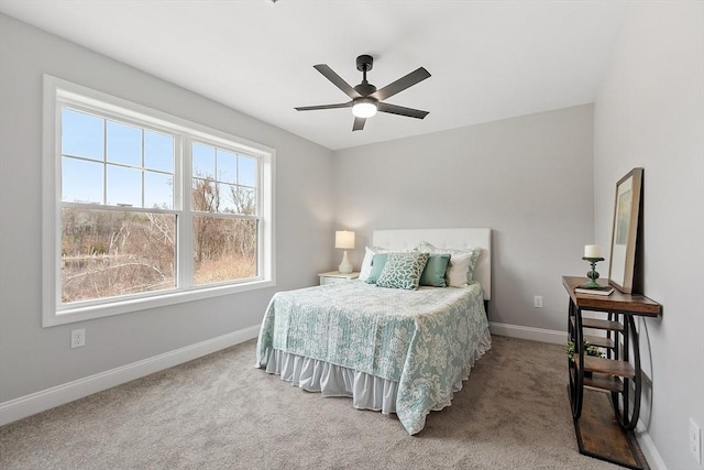 carpeted bedroom with baseboards