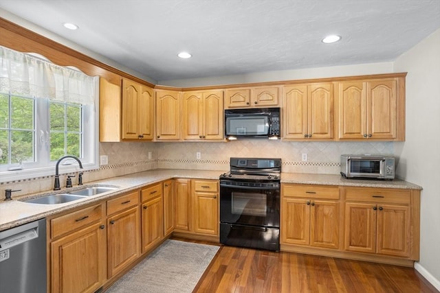 45 Taylor Rd, Maynard, MA 01754 - kitchen featuring black appliances, a sink, dark wood-style flooring, light countertops, and recessed lighting