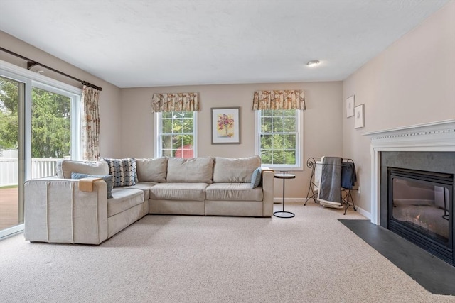 45 Taylor Rd, Maynard, MA 01754 - carpeted living area featuring a fireplace with flush hearth and baseboards
