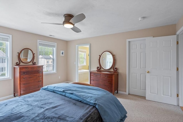 45 Taylor Rd, Maynard, MA 01754 - bedroom with baseboards, a ceiling fan, light colored carpet, and ensuite bath