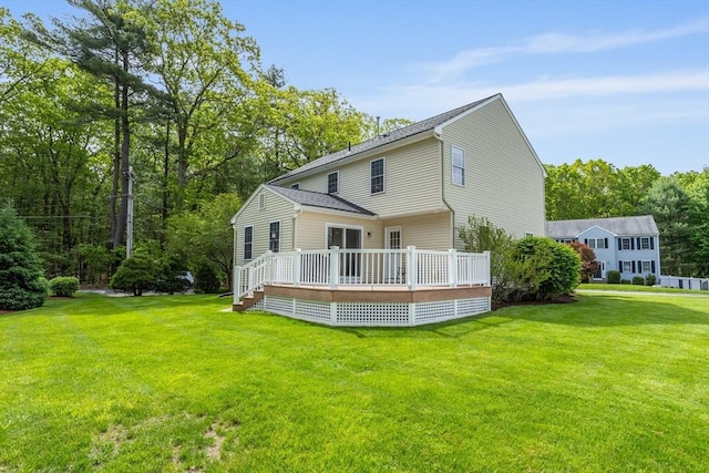 45 Taylor Rd, Maynard, MA 01754 - rear view of house featuring a lawn, a wooden deck, and a shingled roof