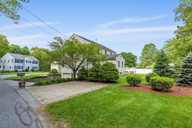 45 Taylor Rd, Maynard, MA 01754 - view of green lawn featuring driveway
