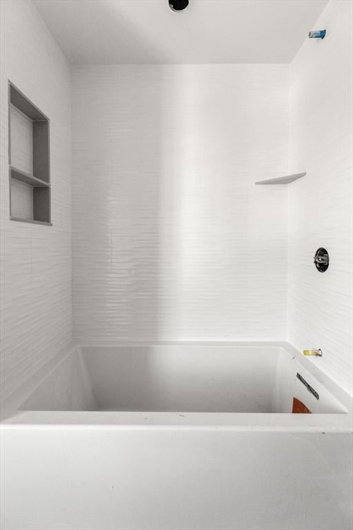 bathroom featuring shower / washtub combination