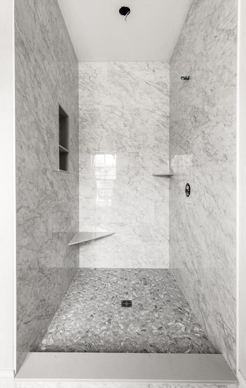 bathroom with a shower