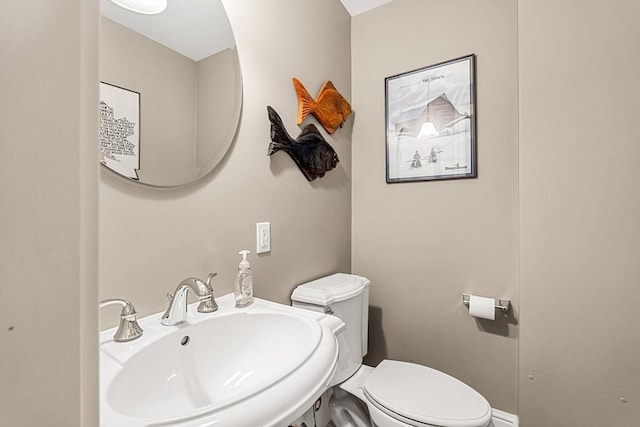 49 Intrepid Cir Unit 49, Marblehead, MA 01945 - half bathroom featuring a sink and toilet