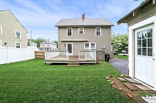 47 Moffatt Rd, Salem, MA 01970 - rear view of house with a chimney and a wooden deck