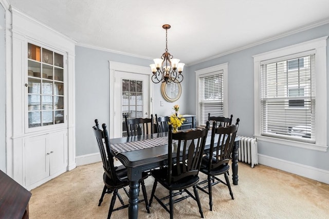 47 Moffatt Rd, Salem, MA 01970 - dining area featuring a chandelier, light carpet, radiator, and crown molding