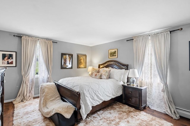 64 Ventura Ln, New Bedford, MA 02745 - bedroom with a baseboard radiator and wood finished floors