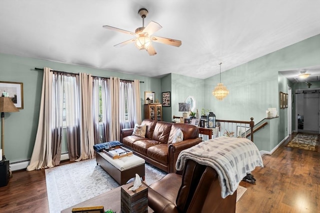 64 Ventura Ln, New Bedford, MA 02745 - living area with dark wood finished floors, a ceiling fan, lofted ceiling, a chandelier, and baseboards