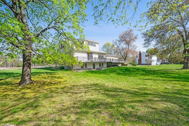 view of yard with a deck