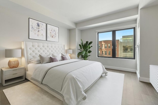 bedroom featuring hardwood / wood-style floors