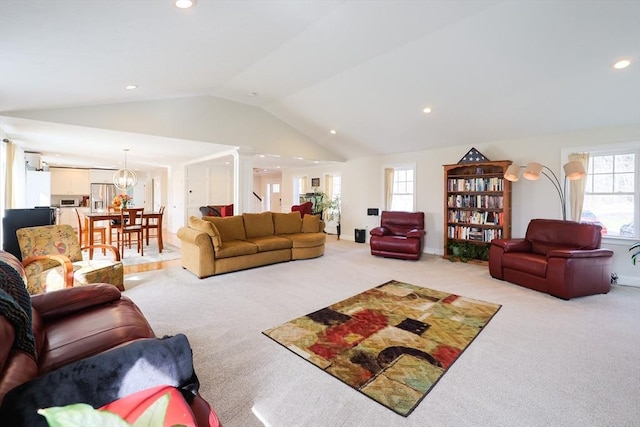 585 Chestnut St, Ashland, MA 01721 - living room featuring light carpet, lofted ceiling, and recessed lighting