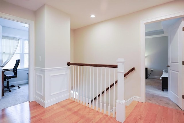 585 Chestnut St, Ashland, MA 01721 - corridor featuring a wainscoted wall, an upstairs landing, a decorative wall, recessed lighting, and light wood-type flooring