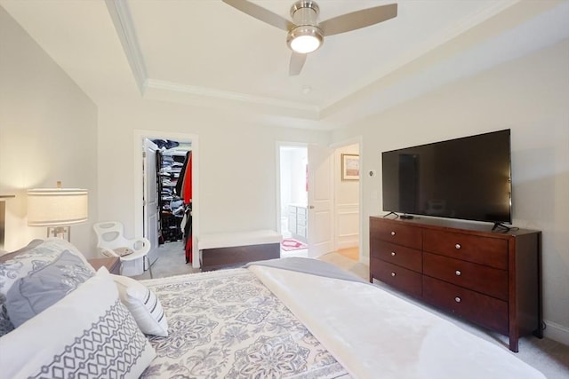 585 Chestnut St, Ashland, MA 01721 - bedroom with a walk in closet, a tray ceiling, light colored carpet, and connected bathroom