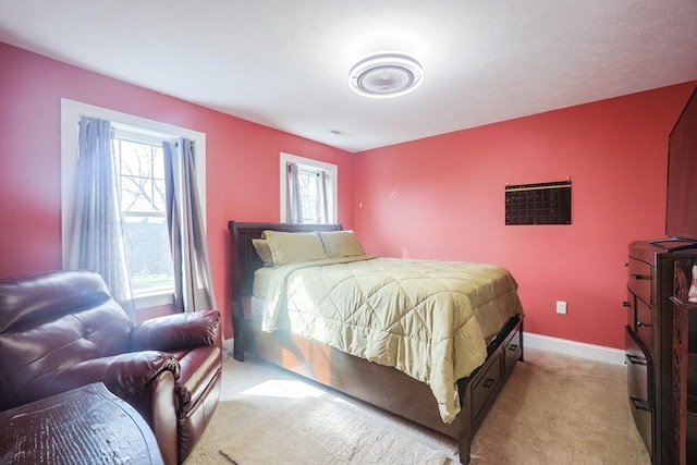 585 Chestnut St, Ashland, MA 01721 - bedroom with light colored carpet, visible vents, and baseboards