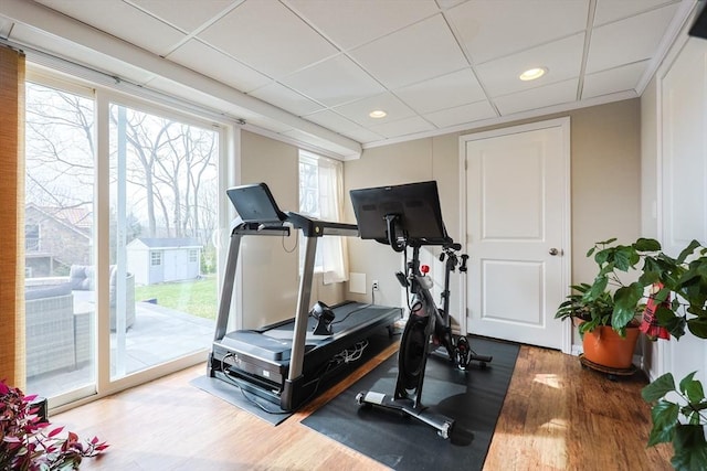 585 Chestnut St, Ashland, MA 01721 - exercise area with recessed lighting, wood finished floors, and a paneled ceiling