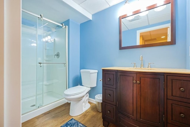 585 Chestnut St, Ashland, MA 01721 - bathroom with a shower stall, wood finished floors, toilet, and vanity
