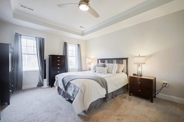 585 Chestnut St, Ashland, MA 01721 - carpeted bedroom with baseboards, visible vents, and a raised ceiling