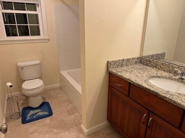 bathroom featuring a washtub, tile patterned floors, toilet, vanity, and walk in shower