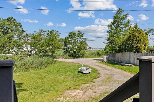 13 Elcott Rd, Quincy, MA 02169 - view of yard featuring dirt driveway