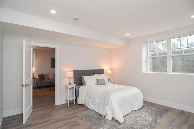 73B Trowbridge St Unit 73B, Belmont, MA 02478 - bedroom with wood finished floors and recessed lighting