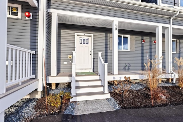 entrance to property with covered porch